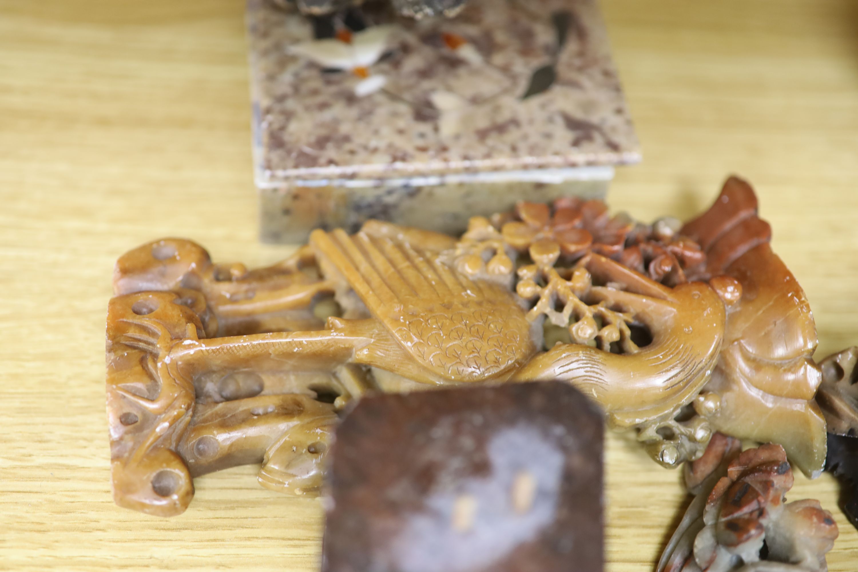 A collection of hardstone and soapstone carvings